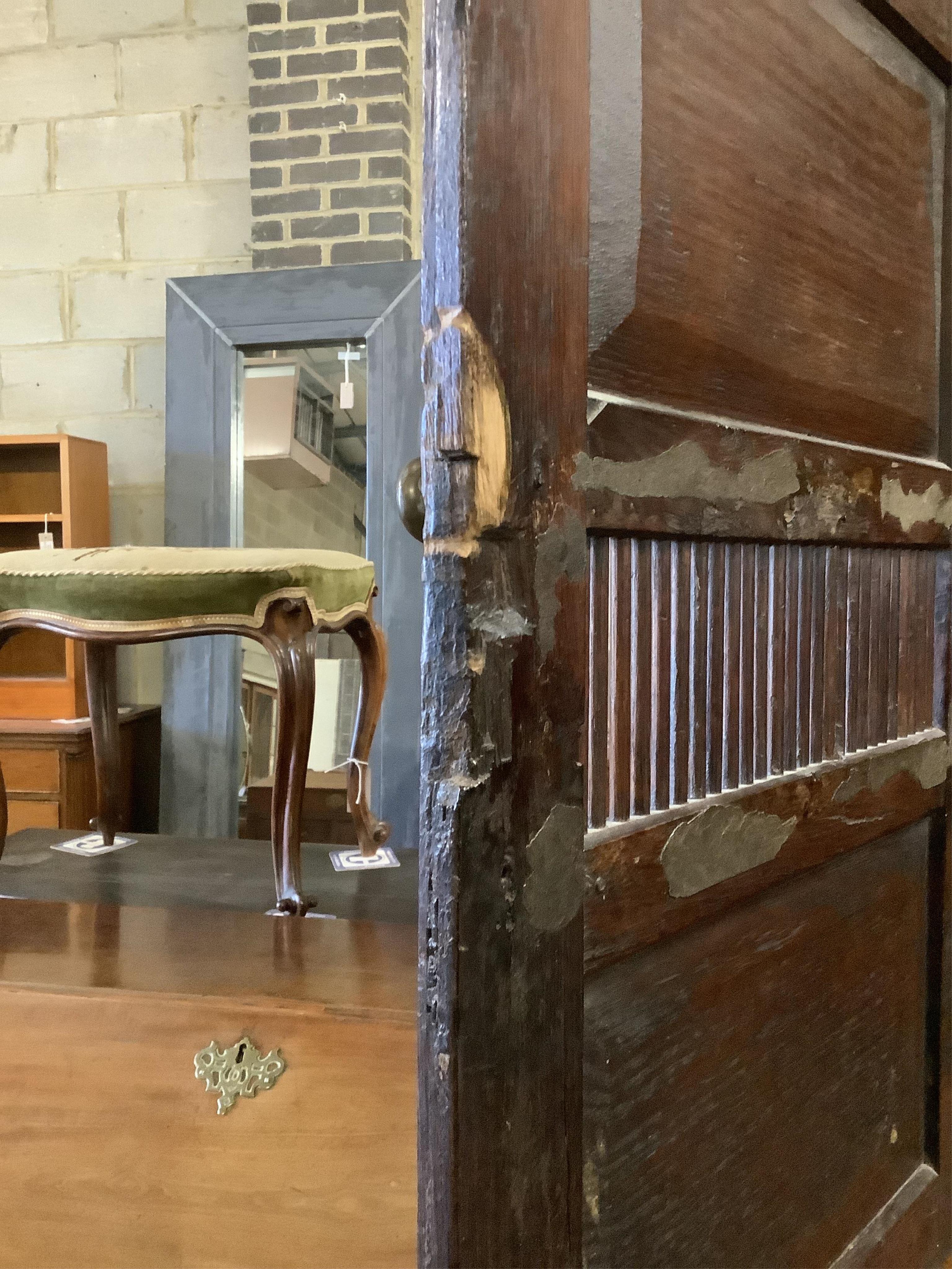 A late 18th century oak cupboard, width 113cm, height 186cm. Condition - fair to good